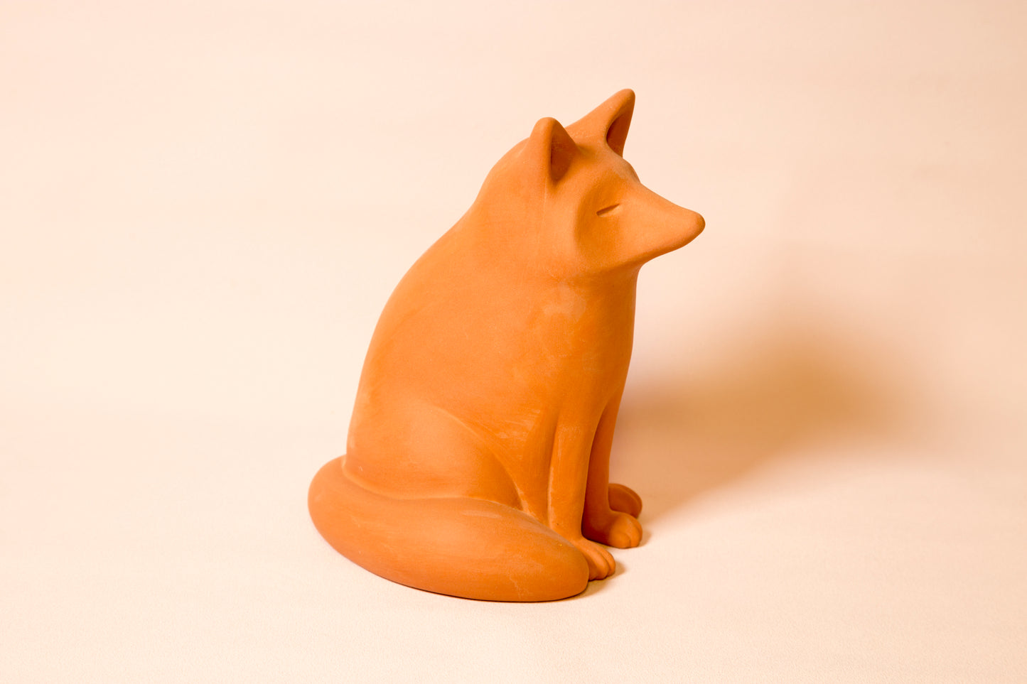 Terracotta fox sculpture
