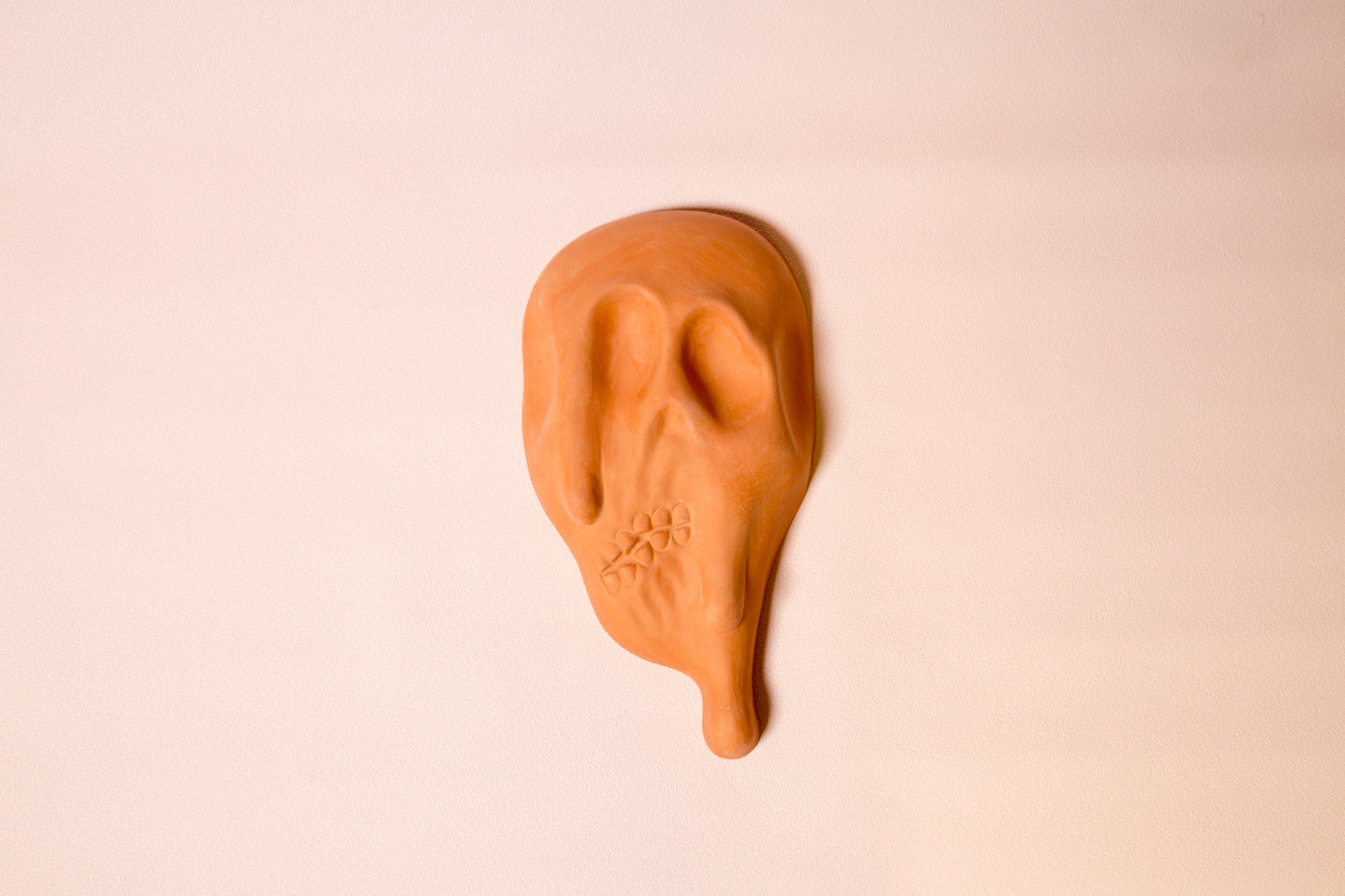 Teracotta molten skull wall ornament