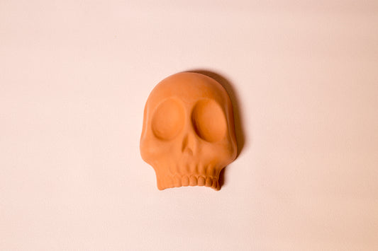 Terracotta skull wall ornament